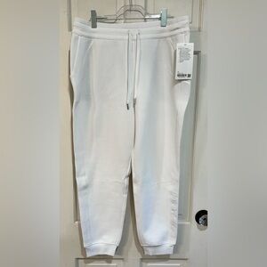 9 pairs of Lululemon joggers, sweats and 6 pairs of leggings. Size 14